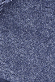 Product shot of the Fringed Triangle Scarf in colour Navy (Blue), detail
