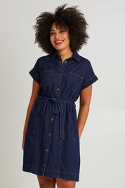Model Olivia wearing size 10 of the Everleigh Denim Dress in colour Drkwash (Blue), from the front, cropped image