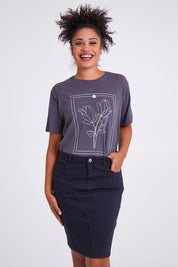 Model Olivia wearing size 10 of the Belle Denim Skirt in colour Washeblack (Black), from the front, cropped image