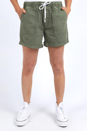 Model Genericm wearing size sample of the Fundamental Emma Relaxed Denim Short – Clover in colour Clover, in a cropped view
