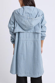 A model wearing the Bennett Denim Parker in colour Bluewhite (Blue), from the back