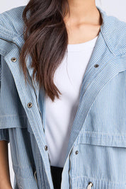 A model wearing the Bennett Denim Parker in colour Bluewhite (Blue), from the front, cropped image