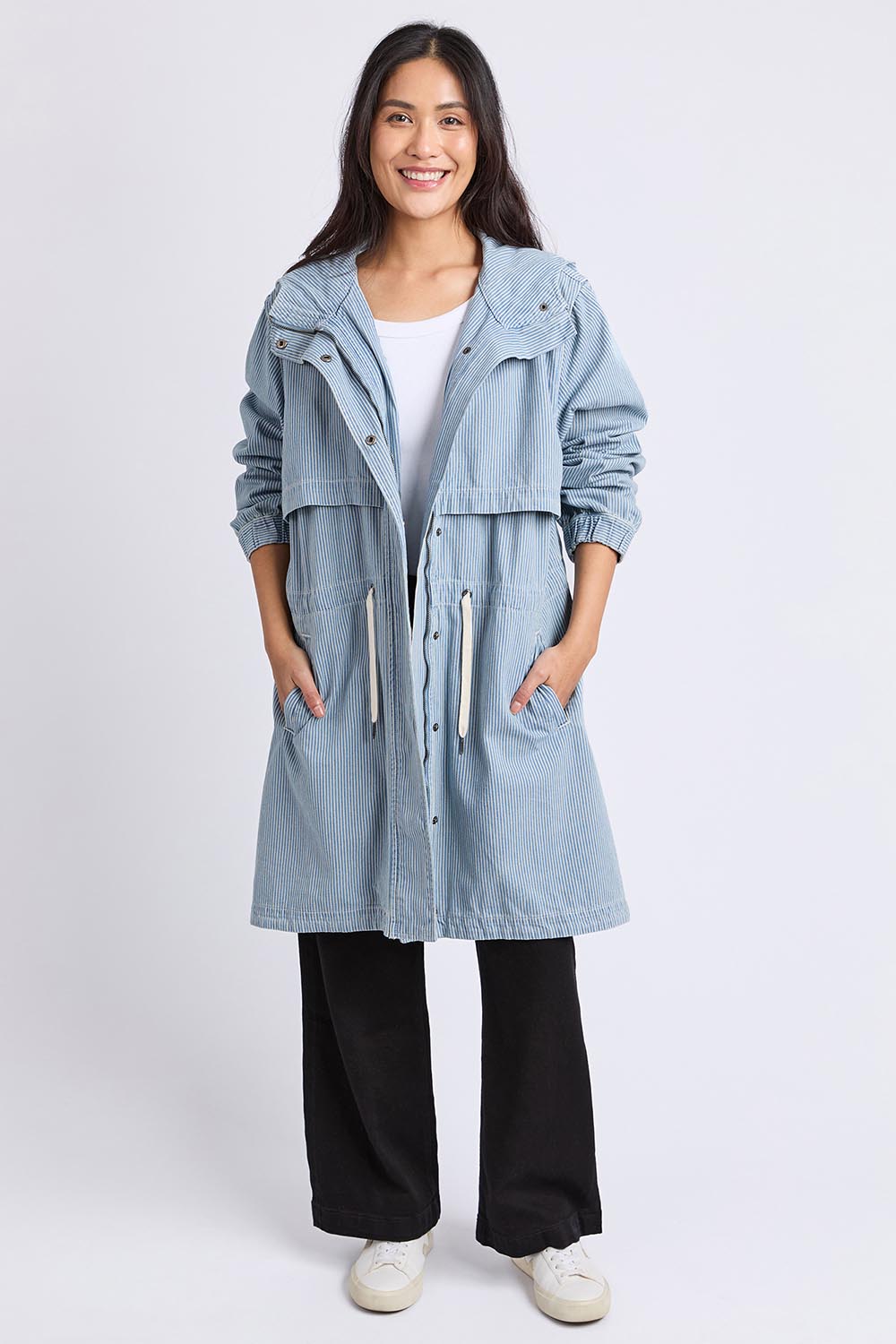 A model wearing the Bennett Denim Parker in colour Bluewhite (Blue), from the front, showing the whole outfit