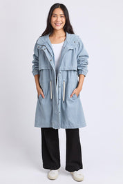 A model wearing the Bennett Denim Parker in colour Bluewhite (Blue), from the front, showing the whole outfit