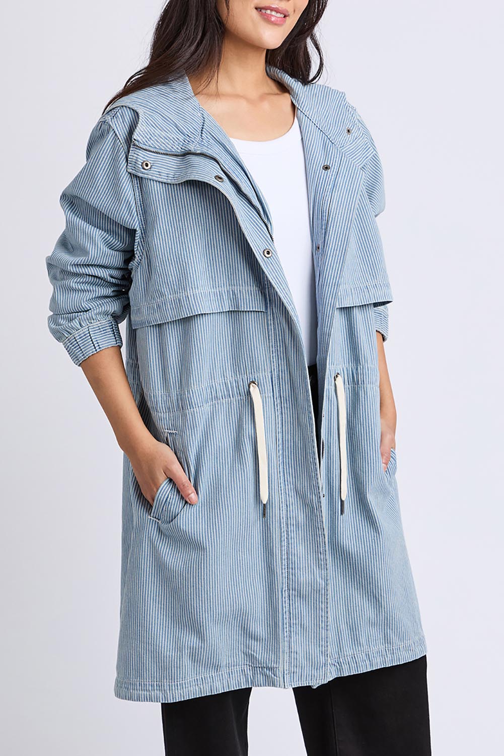 A model wearing the Bennett Denim Parker in colour Bluewhite (Blue), from the front, showing the whole outfit