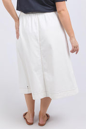 A model wearing the Fundamental Greta Denim Skirt in colour Vintgwhite (White), from the back