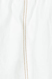 Product shot of the Fundamental Greta Denim Skirt in colour Vintgwhite (White), detail