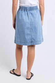A model wearing the Paisley Denim Skirt in colour Lightblue (Blue), from the back
