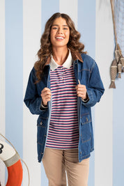 A model wearing the Lilian Denim Barn Jacket in colour Midblue (Blue), from the front, showing the whole outfit