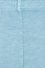 Product shot of the Fundamental Brunch Cotton Pant in colour Duskblue (Blue), detail