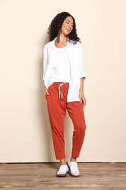Model Pamelar wearing size 10 of the Fundamental Brunch Cotton Pant – Earthbrown in colour Earthbrown, from the front