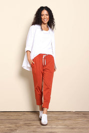Model Pamelar wearing size 10 of the Fundamental Brunch Cotton Pant – Earthbrown in colour Earthbrown, from the front
