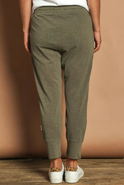 Model Katie wearing size 10 of the Fundamental Brunch Cotton Pant in colour Khaki (Green), from the back