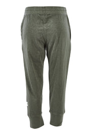 Product shot of the Fundamental Brunch Cotton Pant in colour Khaki (Green), from the back