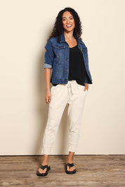 Model Pamelar wearing size 10 of the Fundamental Brunch Cotton Pant - Linen in colour Linen, from the front