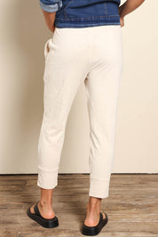 Model Pamelar wearing size 10 of the Fundamental Brunch Cotton Pant - Linen in colour Linen, from the front