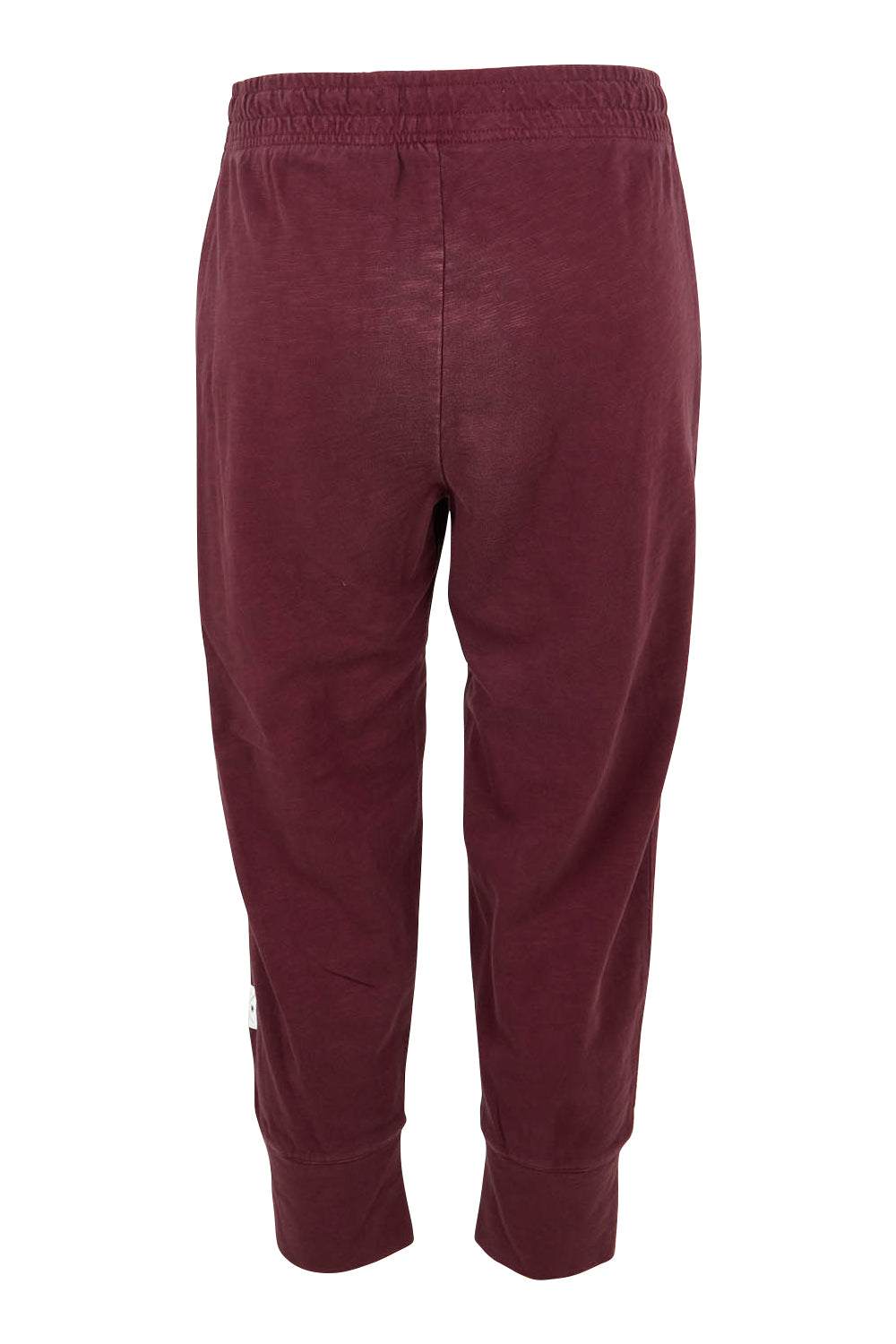 Product shot of the Fundamental Brunch Cotton Pant in colour Merlot (Red), from the back