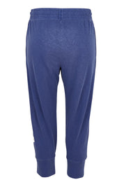 Product shot of the Fundamental Brunch Cotton Pant in colour Vintagebl (Blue), from the back