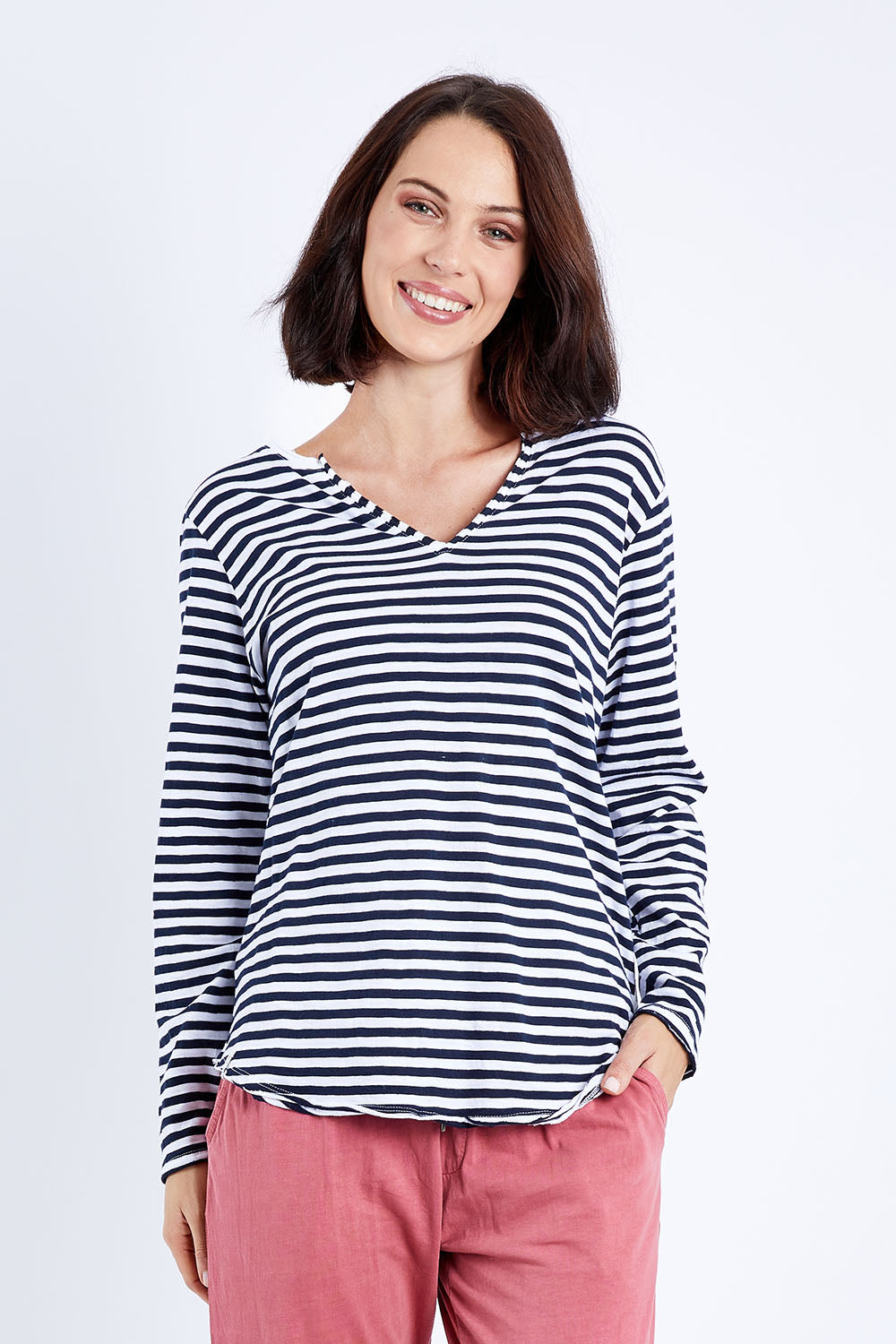 Model Andrea wearing size 10 of the Fundamental Coles Bay Henley in colour Whitenavy (Blue), from the front, cropped image