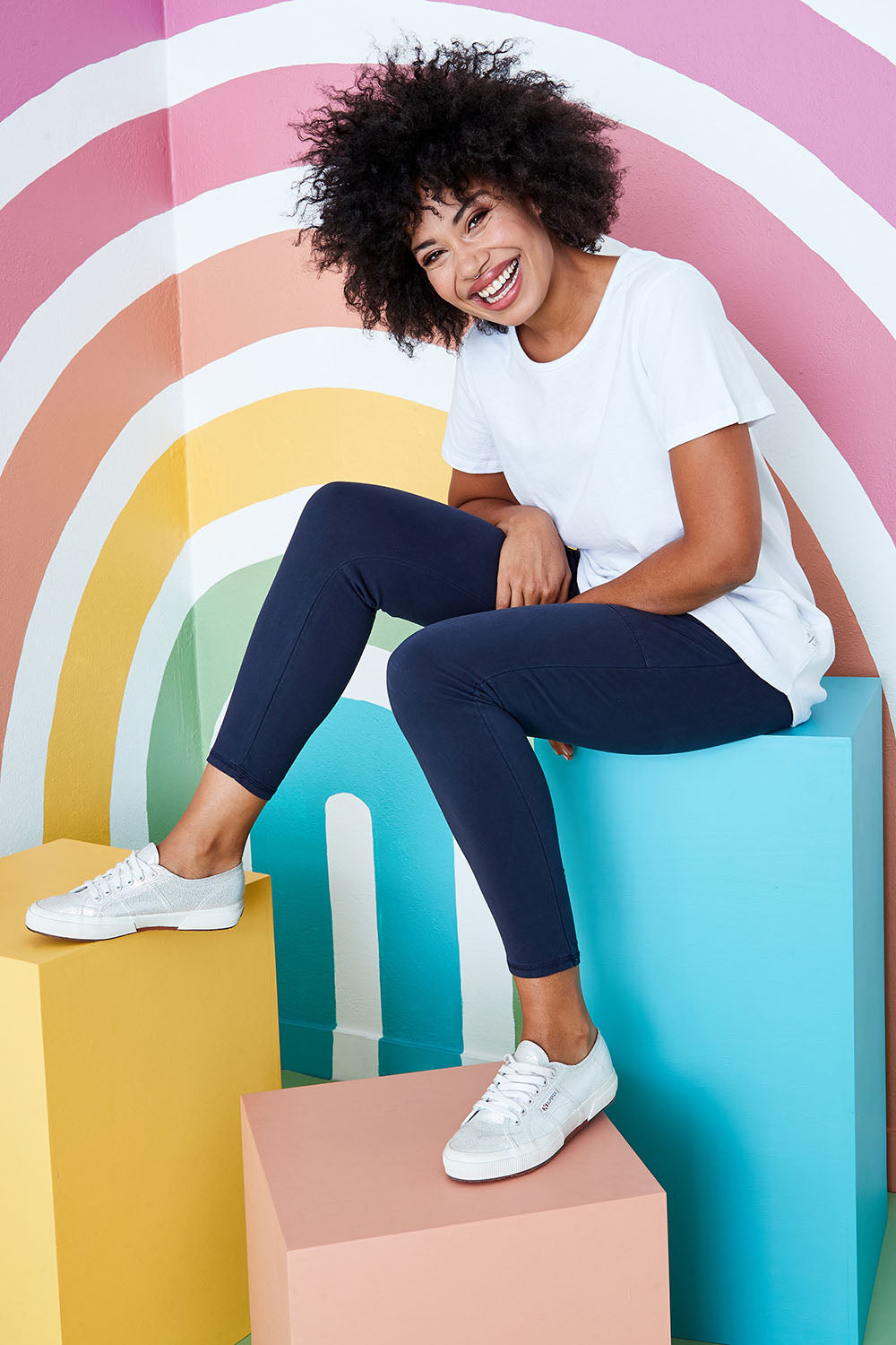 Model Olivia wearing size 10 of the Fundamental Rib Short Sleeve Cotton Tee in colour White (White), from the front, showing the whole outfit