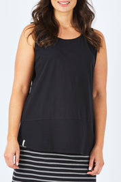 Model Shadae wearing size 10 of the Fundamental Rib Cotton Tank in colour Black (Black), from the front, cropped image