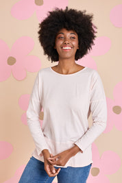 Model Aiyana wearing size 10 of the Fundamental Rib Long Sleeve Tee in colour Palepink (Pink), from the front, showing the whole outfit