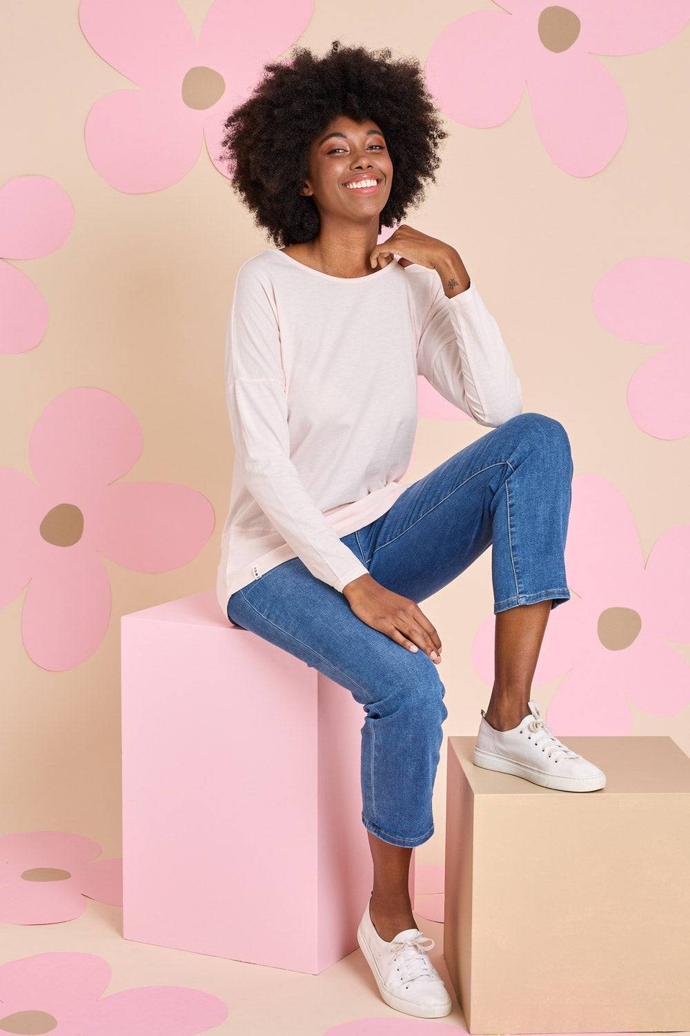 Model Aiyana wearing size 10 of the Fundamental Rib Long Sleeve Tee in colour Palepink (Pink), from the front, showing the whole outfit
