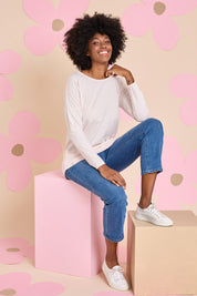 Model Aiyana wearing size 10 of the Fundamental Rib Long Sleeve Tee in colour Palepink (Pink), from the front, showing the whole outfit