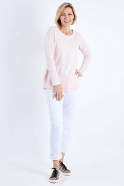 Model Veronica wearing size 10 of the Fundamental Rib Long Sleeve Tee in colour Palepink (Pink), from the front, showing the whole outfit