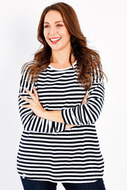 Model Jessica wearing size 14 of the Fundamental Stripe Society L/S Tee in colour Navywhite (Blue), from the front, cropped image