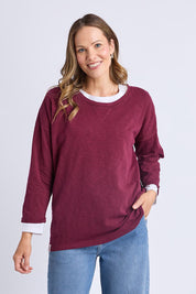 A model wearing the Fundamental Annie 3/4 Sleeve Tee in colour Plum (Purple), from the front, cropped image