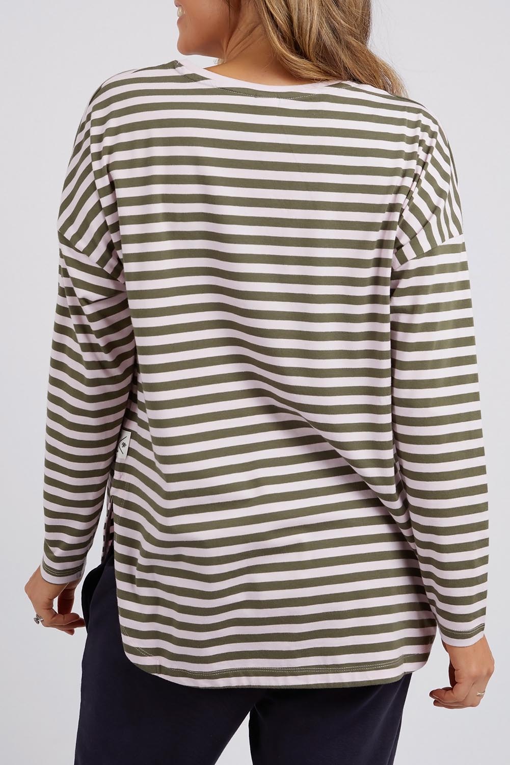 A model wearing the Fundamental Lauren Stripe LS Tee in colour Pinkkhaki (Pink), from the back