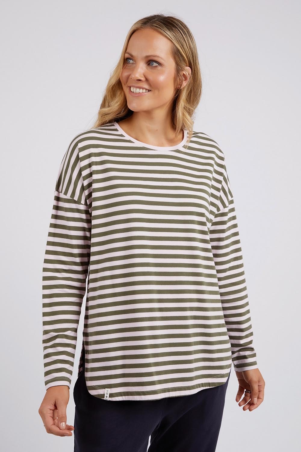 A model wearing the Fundamental Lauren Stripe LS Tee in colour Pinkkhaki (Pink), from the front, cropped image