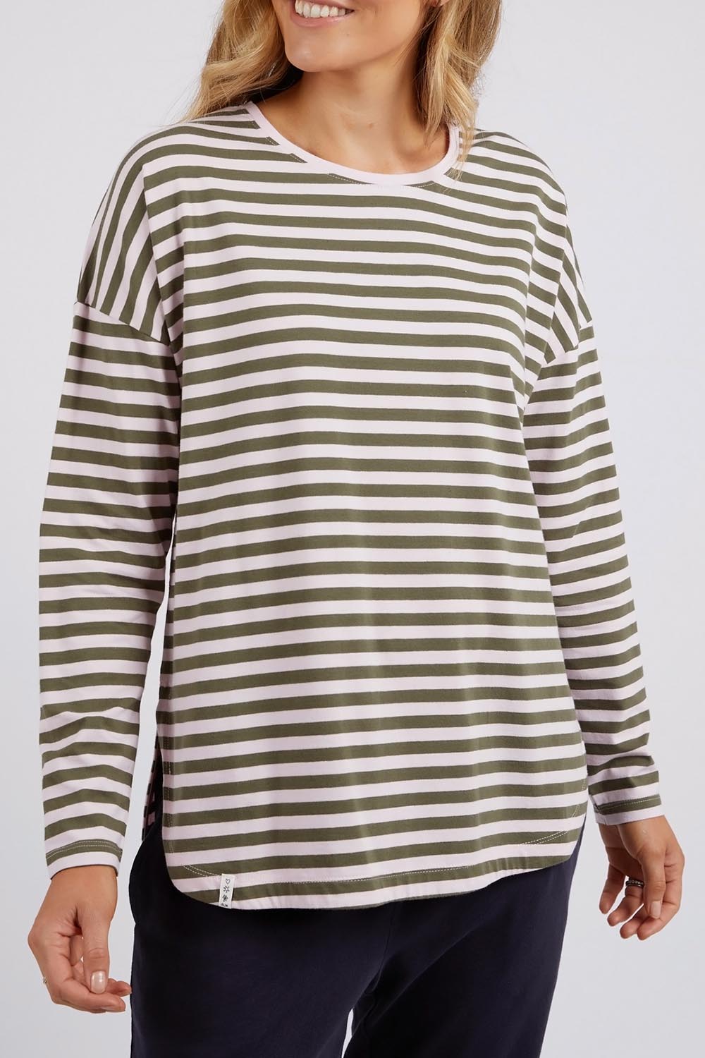 A model wearing the Fundamental Lauren Stripe LS Tee in colour Pinkkhaki (Pink), from the front, cropped image