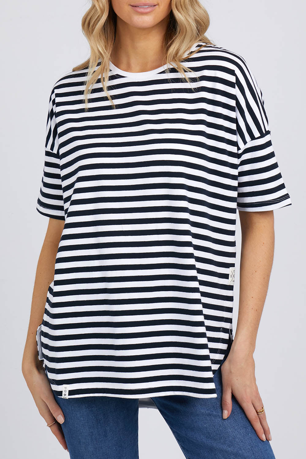 A model wearing the Fundamental Lauren S/S Cotton Stripe in colour Navywhit (Blue), from the front, cropped image