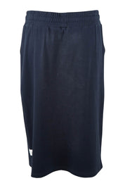 Product shot of the Fundamental Rib Midi Skirt in colour Navy (Blue), from the back