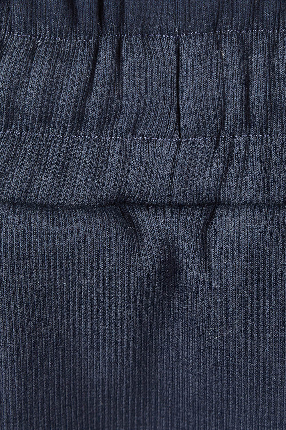 Product shot of the Fundamental Rib Midi Skirt in colour Navy (Blue), detail