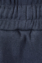 Product shot of the Fundamental Rib Midi Skirt in colour Navy (Blue), detail