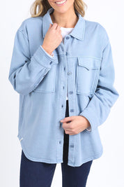 A model wearing the Fundamental Poppy Cotton Fleece Shacket in colour Steelblue (Blue), from the front, cropped image