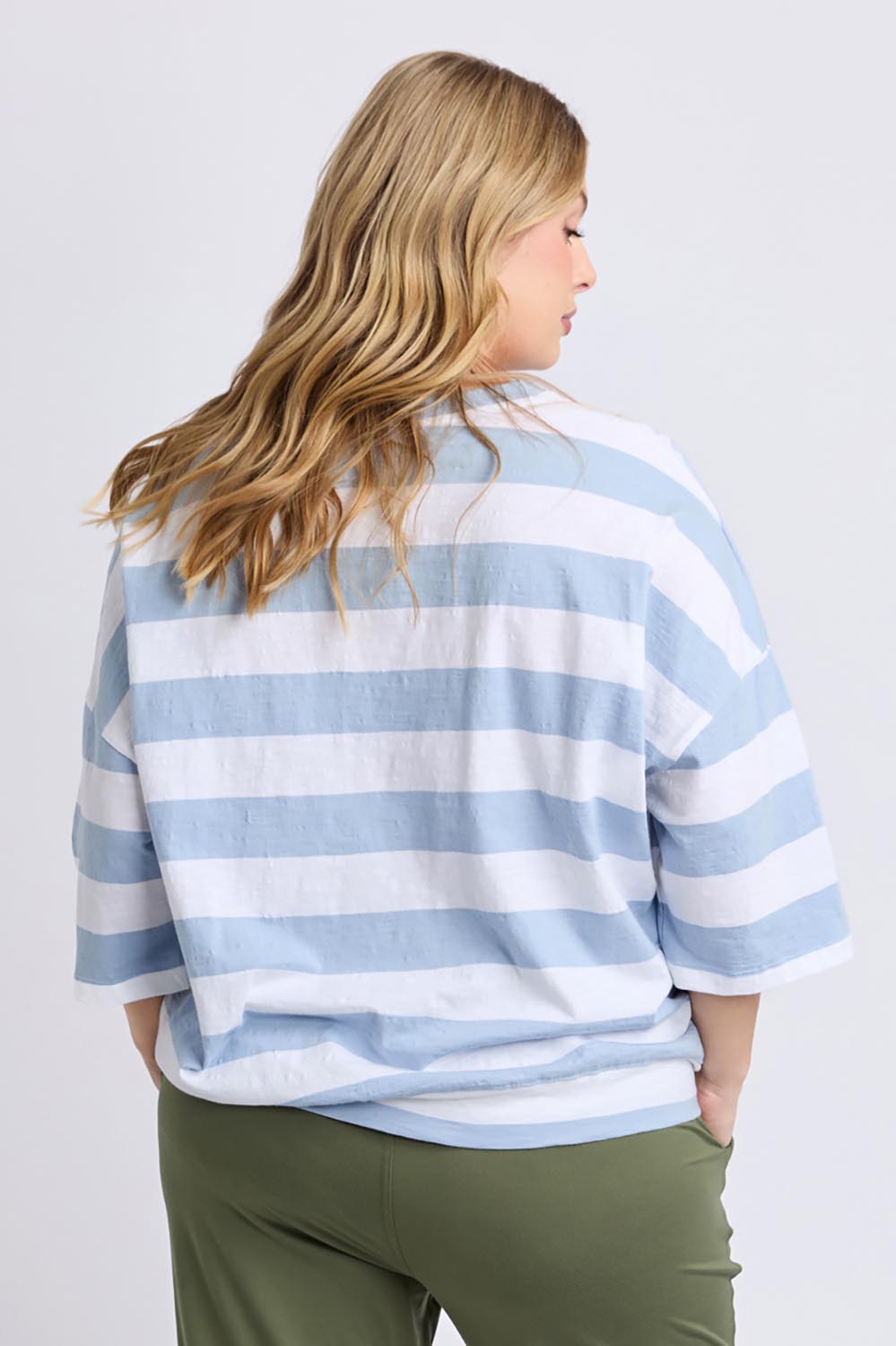 A model wearing the Fundamental Mazie Block Stripe Cotton Sweat in colour Skybluestr (Blue), from the back