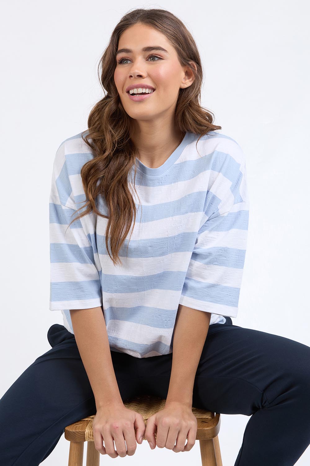 A model wearing the Fundamental Mazie Block Stripe Cotton Sweat in colour Skybluestr (Blue), from the front, cropped image