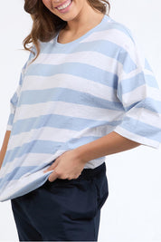 A model wearing the Fundamental Mazie Block Stripe Cotton Sweat in colour Skybluestr (Blue), from the front, cropped image