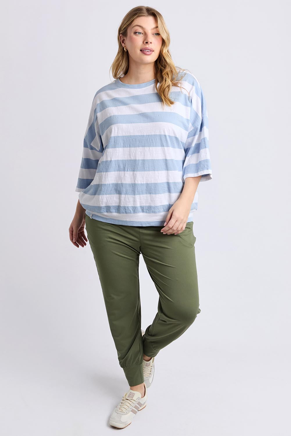 A model wearing the Fundamental Mazie Block Stripe Cotton Sweat in colour Skybluestr (Blue), from the front, showing the whole outfit