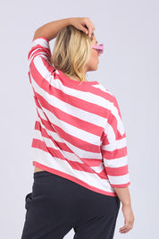 A model wearing the Fundamental Mazie Block Stripe Cotton Sweat in colour Watermelon (Red), from the back