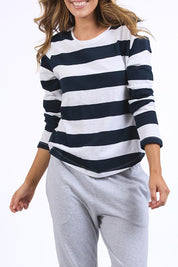 A model wearing the Fundamental Spritz Stripe Cotton Tee in colour Navywhite (Blue), from the front, cropped image