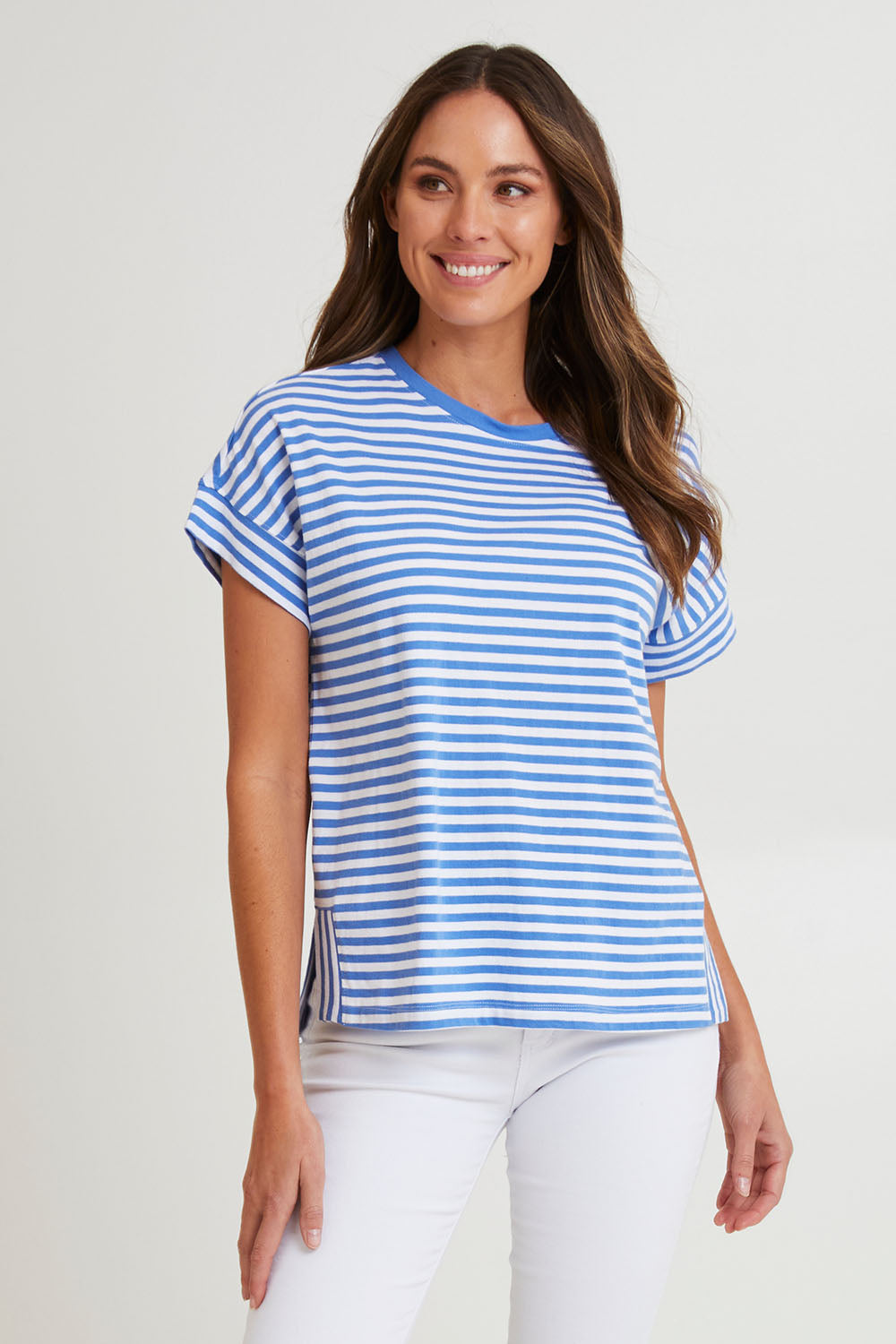 Model Madeline wearing size 10 of the Fundamental Yara Stripe Ss Tee in colour Bluewhite (Blue), from the front, cropped image