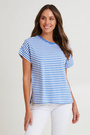 Model Madeline wearing size 10 of the Fundamental Yara Stripe Ss Tee in colour Bluewhite (Blue), from the front, cropped image