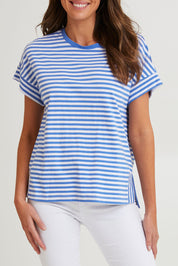 Model Madeline wearing size 10 of the Fundamental Yara Stripe Ss Tee in colour Bluewhite (Blue), from the front, cropped image