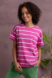 Model Genericm wearing size sample of the Fundamental Halli Cotton Short Sleeve Tee - Magentawht in colour Magentawht, in a cropped view