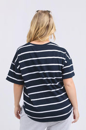 A model wearing the Fundamental Halli Cotton Short Sleeve Tee in colour Navyst (Blue), from the back